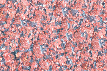 granite wall surface, facade, red-gray with black dots
