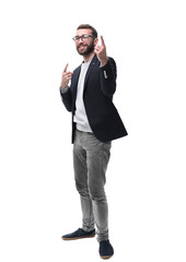 in full growth. successful business man pointing up at copy space