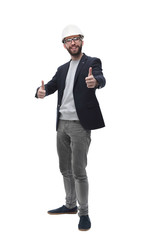 in full growth. qualified businessman architect showing thumb up