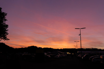 Beautiful sunset over the Theresienwiese during the Oktoberfest in Munich, Germany.