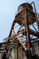 Rustic water tank in abandoned factory