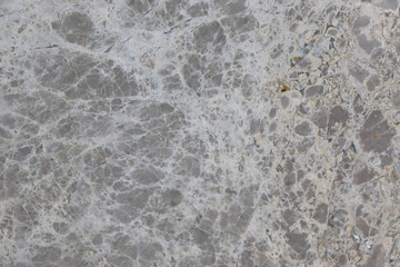 granite wall surface, facade, red-gray with black dots