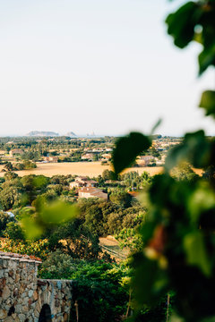 View of the rural environment of Baix Emporda with Medes Islands in the background, Pals, Catalonia, Spain