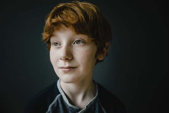 Portrait of redheaded boy with freckles