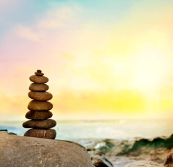 beautiful pebble stack on a sandy beach