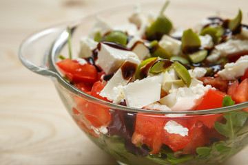 Glass bowl with Greek salad