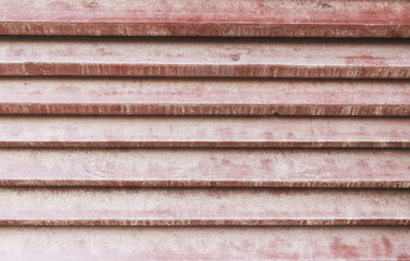 Wooden background, painted surface of the old brown boards. Weathered brown wood texture. The horizontal location.