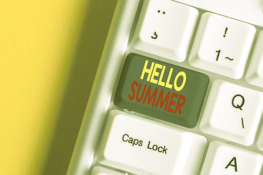 Word writing text Hello Summer. Business photo showcasing season after spring and before autumn where the weather is hot White pc keyboard with empty note paper above white background key copy space