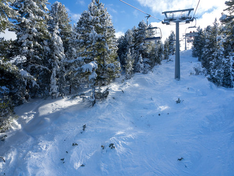 BANSKO, BULGARIA - January 2017 - Lift with tourist travel to snow top. Bansko is a ski resort in southwestern Bulgaria.