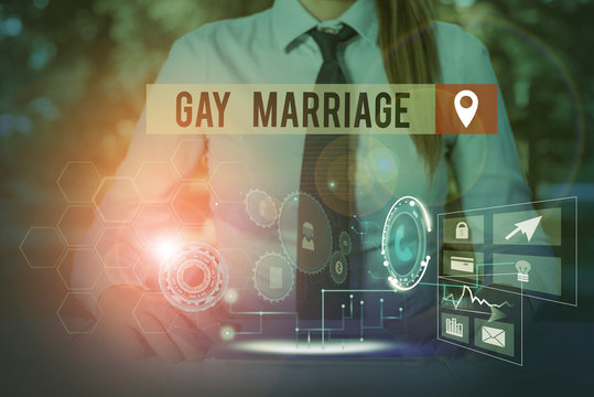 Handwriting text Gay Marriage. Conceptual photo entered into in a civil or religious ceremony of the same sex Woman wear formal work suit presenting presentation using smart device