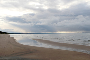 Large waves of sea and dark clouds