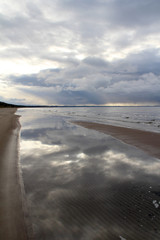 Large waves of sea and dark clouds