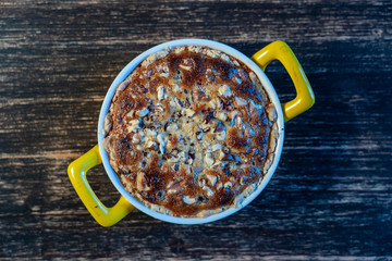 Homemade organic currant pie with walnut, dessert ready to eat. Currant tart on the old wooden background, closeup