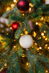 Obraz na płótnie Canvas Christmas tree toy on Christmas decorated Christmas tree