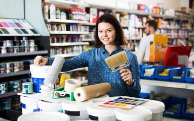 Woman in paint supplies store
