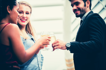 Business group Holding a champagne glass congratulate In the success of the business done together, to teamwork concept.