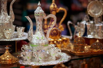 Silver tea set in an oriental gift shop. Tea ceremony.