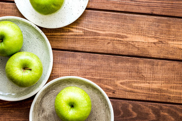 fresh organic green fruits with apples on wooden background top view mock-up