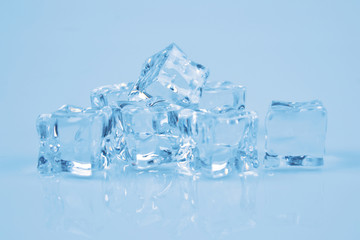stack of ice cubes on blue