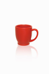 red mug on a white background