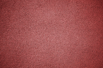 Rubber floor texture. Granules playground cover background.