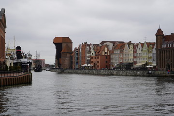 Fototapeta premium Gdansk, Poland - September 2019: The cargo ship Soldek is moored on the promenade in the city center. View of the city embankment and cargo ship Soldek.
