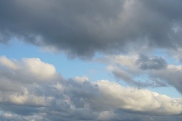 Naklejka na ściany i meble White Clouds on a Clear Blue Sky