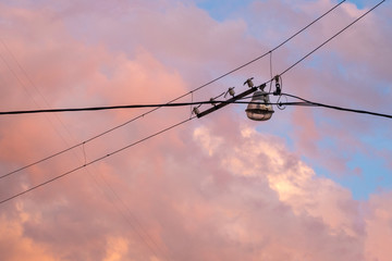Street lantern against sunset sky