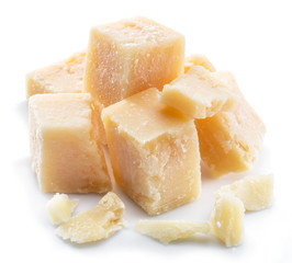 Parmesan cheese cubes isolated on white background.