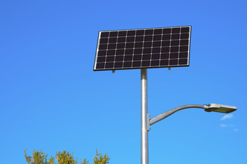 solar panel with sun and blue sky