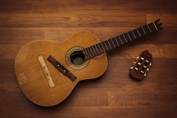 Classical nylon string guitar with broken off headstock and bridge