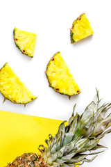 summer mockup with pineapple on yellow and white background top view