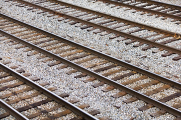Fototapeta premium Several Parallel Railroad Train Tracks In A Rail Yard