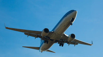 Fototapeta na wymiar KLM Airlines plane landing