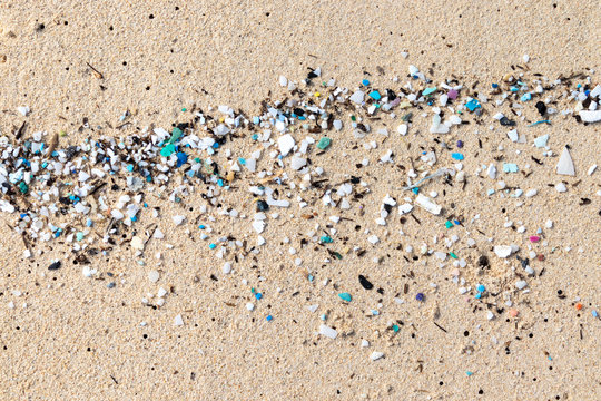 Micro Plastics Washing Ashore On The Beach In Hawaii, USA