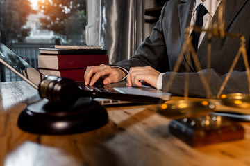 Lawyer working with laptop and interface icon