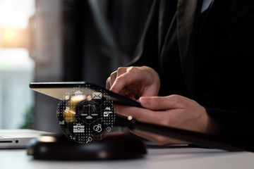 Lawyer working with laptop and interface icon