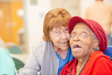 Two Older Woman Together in a Senior Center
