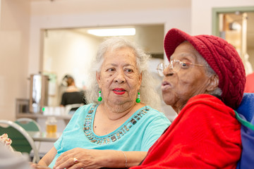 Two Older Woman Together at a Senior Center