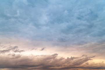 Obraz premium Dark clouds. Cloudy rainy gray sky in the evening at sunset.
