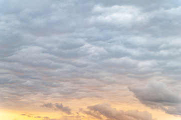 Dark clouds. Sky with a lot of clouds in the evening at sunset.