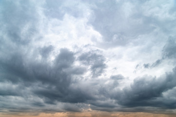 Obraz premium Dark clouds. Sky with a lot of heavy gray clouds in the evening at sunset.