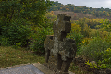 Abandoned Stone Cross Grave Marker