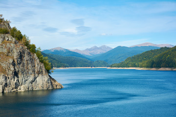 Dam and reservoir on Lake Vidraru. Hydropower construction, waterworks Dam Vidrau on Transfagarash highway in Romania.