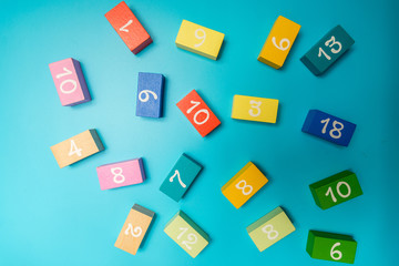colored cubes with numbers on a blue background