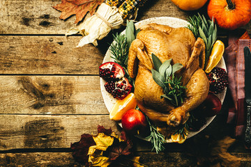 Selection of traditional thanksgiving food - turkey, mashed patatoes, green beans, apple pie on rustic background