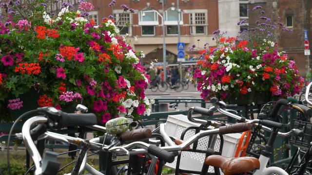 amsterdam city center day time bridge flowers bicycle parking slow motion panorama 4k netherlands 