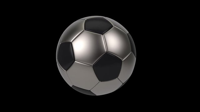 Realistic black and iron soccer ball isolated on black background. 3d looping animation.