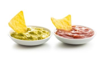 Corn nacho chips with avocado and tomato dip.