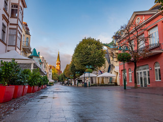 Beautiful architecture of Sopot, church and Monte Cassino street at morning, Poland. October.